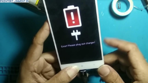 cara mengatasi error please plug out charger